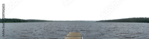 Foto Panoramic view of a summer lake in a park evergreen forest with a transparent sky