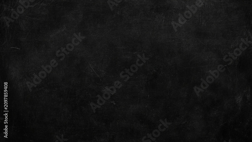 Quadro su tela Black scratched and scuffed surface texture background with scratches and marks