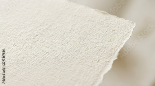 Linen paper texture. Close-up of natural fiber paper background
