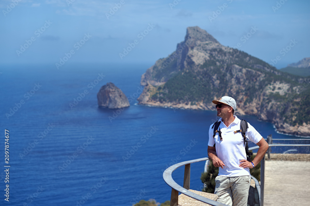 Obraz premium Traveler enjoying panoramic view at Cap de Formentor Mallorca Spain