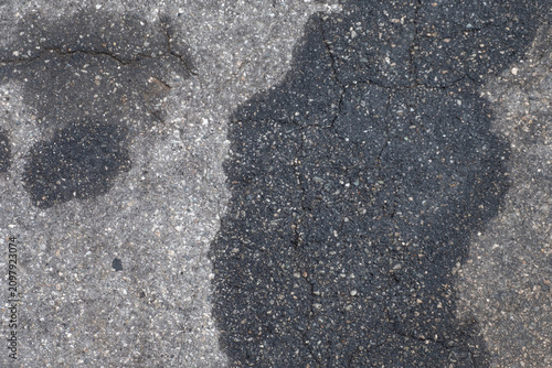 asphalt texture background with oil stains