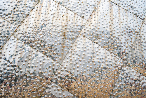 Texture of the metal structure with dots