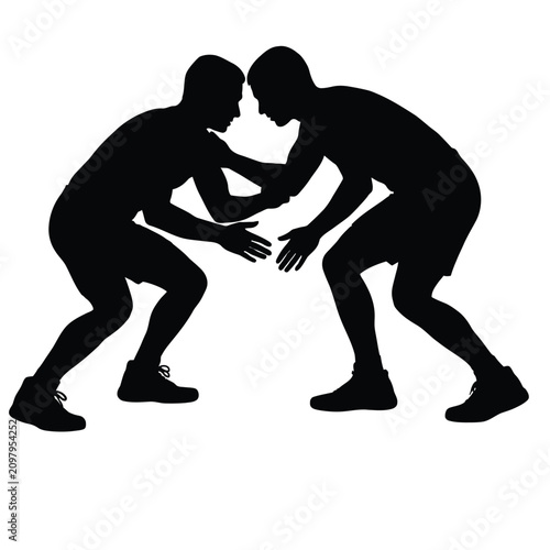 Foto Silhouette of two wrestlers in a starting position