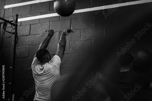 Photography Cross fit Hyrax training exercises medicine ball wall throw