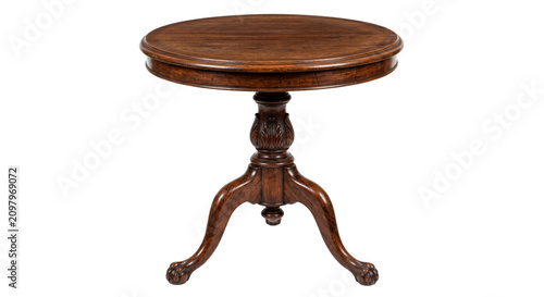 Photos Elegant round wooden table with intricate craftsmanship and classic design