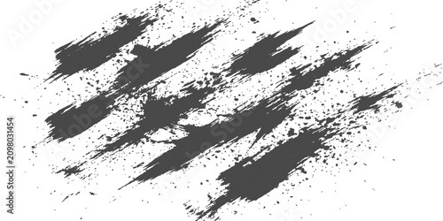 Fotografía Dark granular powder splatters in diagonal brush strokes on a clean white backgr