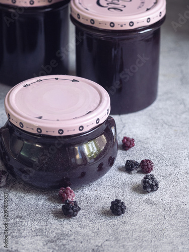 Stack of jars of homemade blackberry jam
