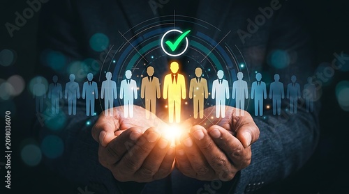 Human resource manager holding holographic interface with selected candidate icon representing recruitment success and talent acquisition in corporate staffing