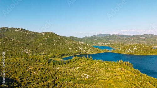 Fotografie Aerial view of the beautiful Bacina Lakes surrounded by green hills and Mediterr