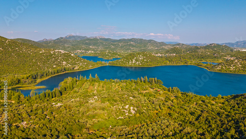 Konstfotografi Aerial view of Bacina Lakes in Dalmatia, Croatia, featuring blue water surrounde