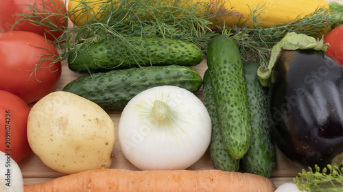 Healthy seasonal vegetables arranged as a colorful flat lay background. Ideal for cooking, healthy eating, food advertising, recipe design and organic products.