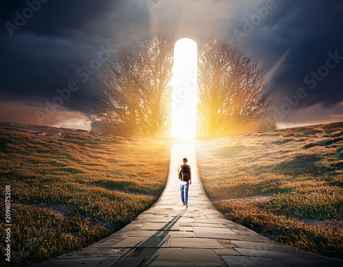 Lonely figure in cloudy tunnel, concept of entrance to the afterlife. heaven afterlife concept