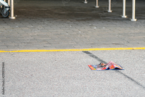 Canvastavla Discarded Advertising Brochure Outside Store Entrance Highlighting Wasteful Pape