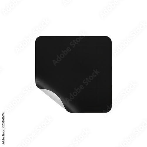 Black sticky note with corner peeled off