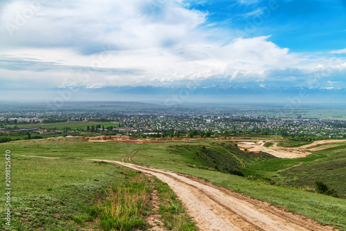 Foto Elevated View Across Karakol Valley And Tian Shan Foothills In Kyrgyzstan