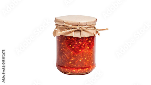 Tableau sur toile Glass jar of spicy red chili pepper salsa sauce cooking condiment isolated on tr