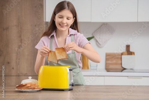 Smiling young woman in an a...