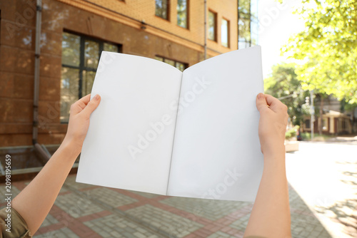 Person holding an open blan...