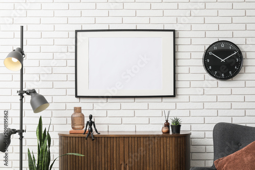 Empty picture frame on a wh...