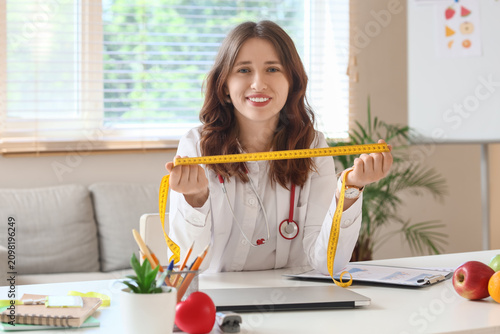 Smiling female nutritionist...