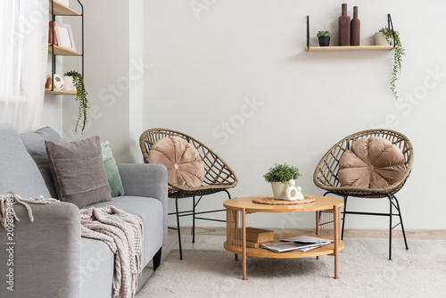 Comfortable sofa, wooden ta...