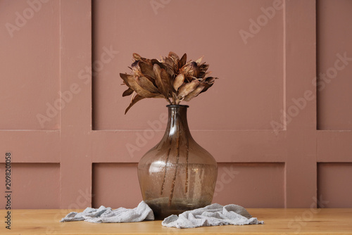 Vase with dried protea flow...
