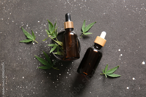 Bottles of hemp cosmetic oi...
