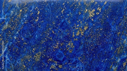 Close-up of Blue Surface with Gold Flakes for Artistic Backgrounds.