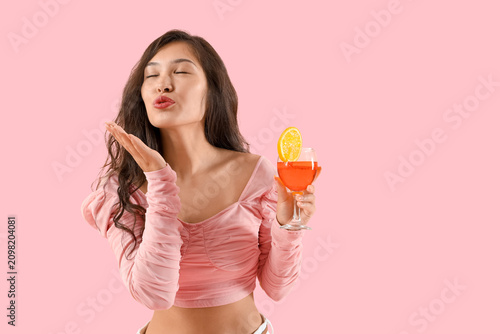 Young Asian woman with aper...