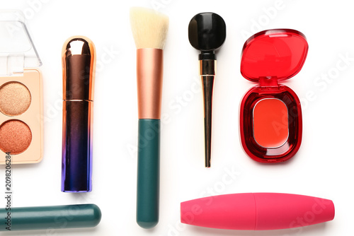 Set of different decorative cosmetics on white background  flat lay