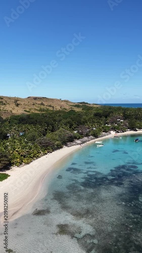 Vertical drone view of a coral reef and beach, Oarsmans Bay, Fiji