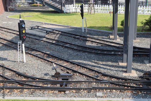 Kyushu Railway History Museum outdoor exhibition miniature train track switch on the ground in Fukuoka, Japan, May 13, 2026