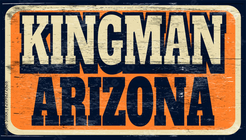 Aged retro Kingman Arizona sign on wood