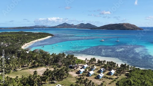 Drone view of beach bungalows at a resort, Oarsmans Bay, Nacula Island, Fiji
