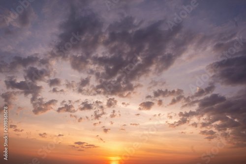 Panoramic view of sunset golden and blue sky nature background.
Colorful dramatic sky with cloud at sunset.Sky background.Sky with clouds at sunset.