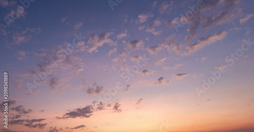 Panoramic view of sunset golden and blue sky nature background.
Colorful dramatic sky with cloud at sunset.Sky background.Sky with clouds at sunset.