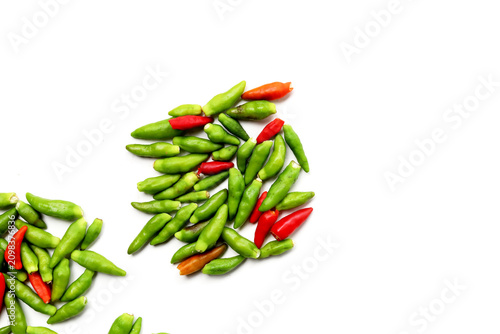 Obraz na plátně Fresh bird's eye chilies on white background.