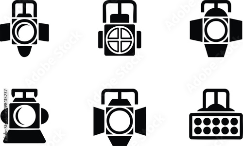 Foto Collection of black stage lights on white background for theater and performance