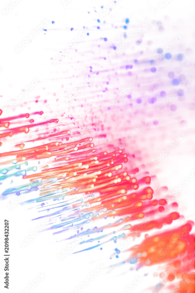 Fototapeta premium is dominated by a powerful diagonal flow of luminous, streaking lines and particles that originate from the lower-left corner and surge towards.