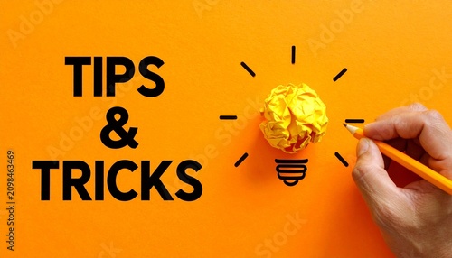 Hand drawing lightbulb symbolizing tips tricks creativity