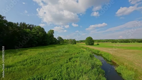 Low FPV Flight Above the Small Grabia River in Central Poland on a Summer Day