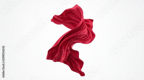 Flowing red silk fabric waving in the air