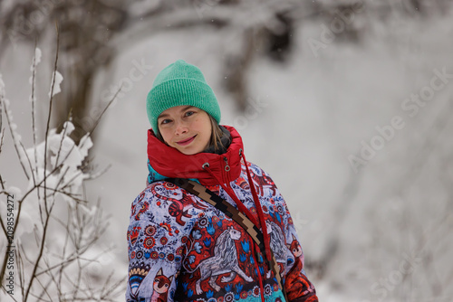 Cuadro en lienzo Winter wonderland escapade featuring a young woman in vibrant jacket and beanie