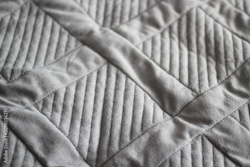 Obraz na płótnie Grey plaid bed cozy comfortable soft photo