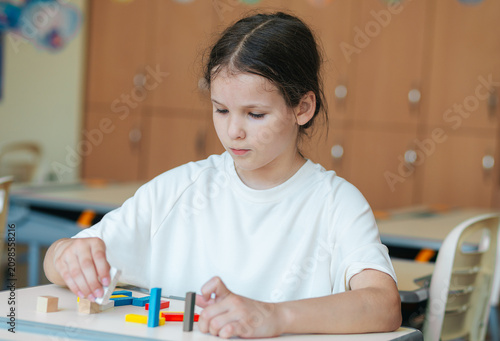 Fotografía Young Child Engaged in Creative Building Activity With Colorful Blocks in a Brig
