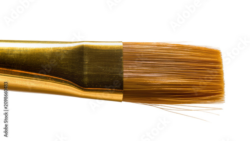 Tableau sur toile Flat golden ferrule paintbrush with brown bristles, isolated on transparent back
