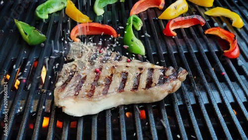 Konstfotografi Fresh fish grilling on barbecue with colorful vegetables