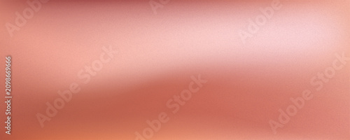 Gritty, noisy background with a luxurious rose gold or champagne gold texture