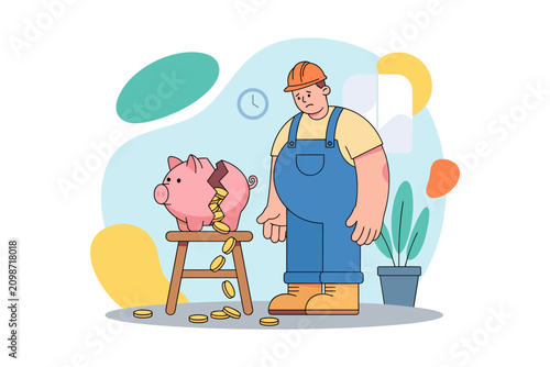 Sad construction worker looks at a broken piggy bank with coins spilling out