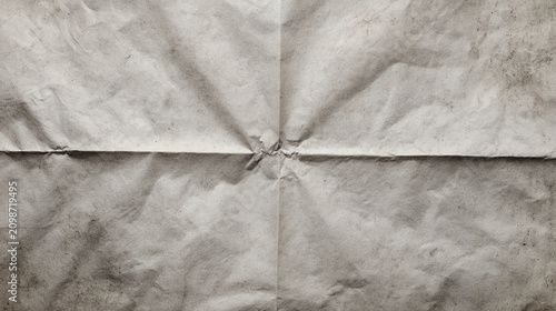 A textured background of crumpled, aged paper, ideal for various design projects or creative works.